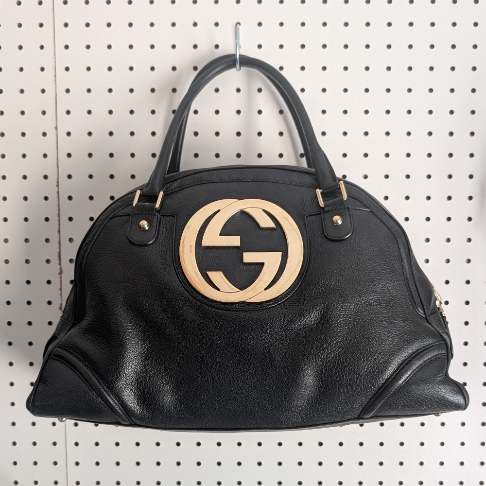 Gucci Black Satchel with Iconic Gold GG Emblem